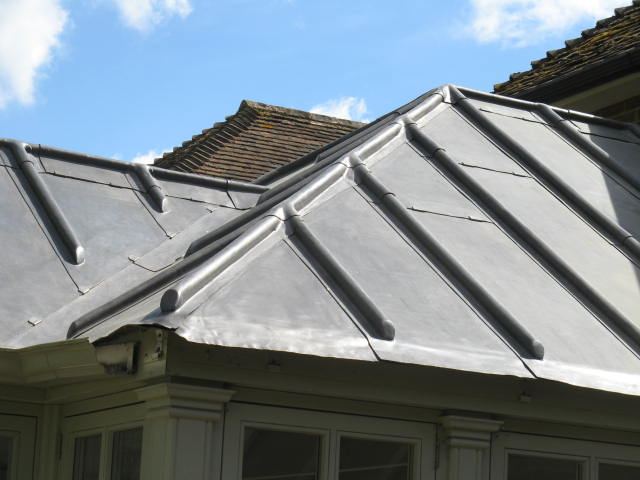Close-up of lead hips and rolls on a conservatory roof